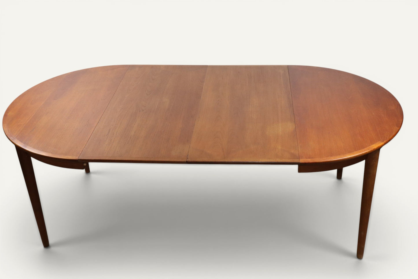 Table ronde de repas extensible danoise en teck – Années 1960