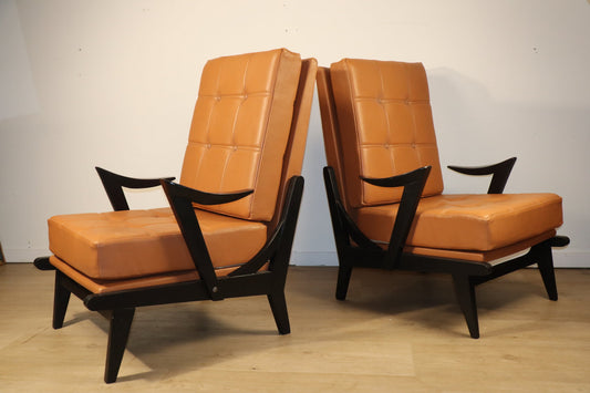 Paire de fauteuils vintage années 50 en bois noir et cuir caramel