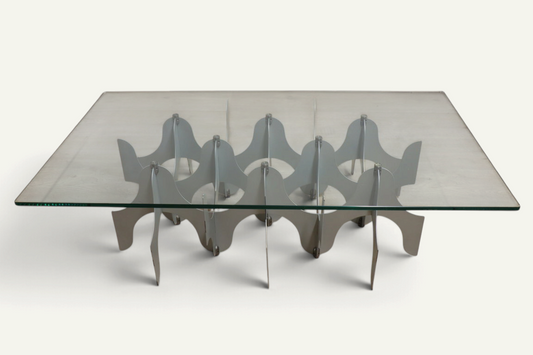 Minimalist sculptural coffee table in metal and glass