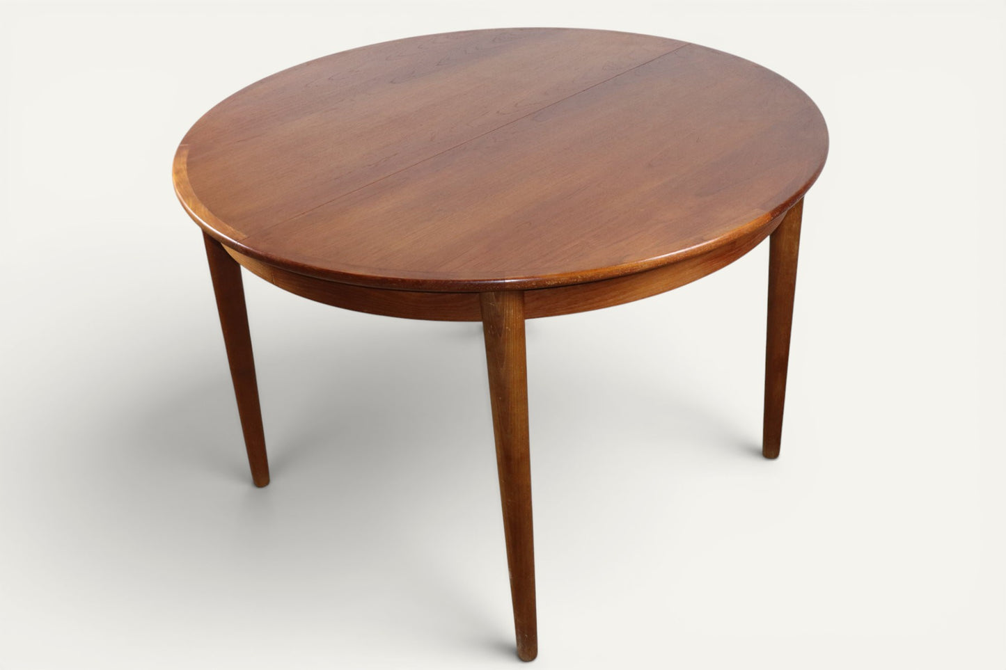 Table ronde de repas extensible danoise en teck – Années 1960