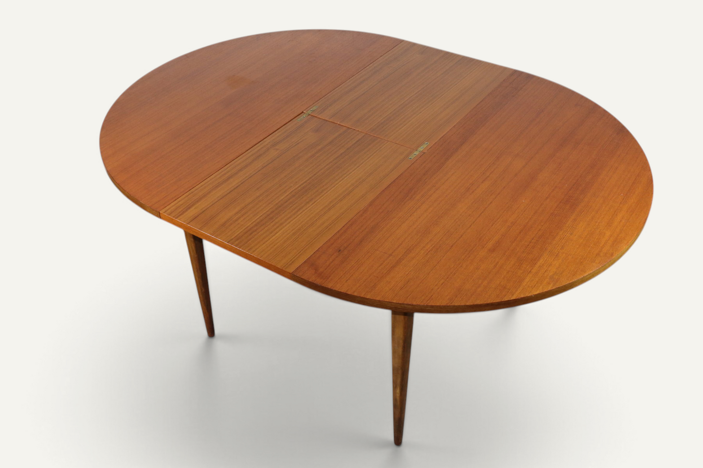Table de repas ronde extensible en teck – années 60
