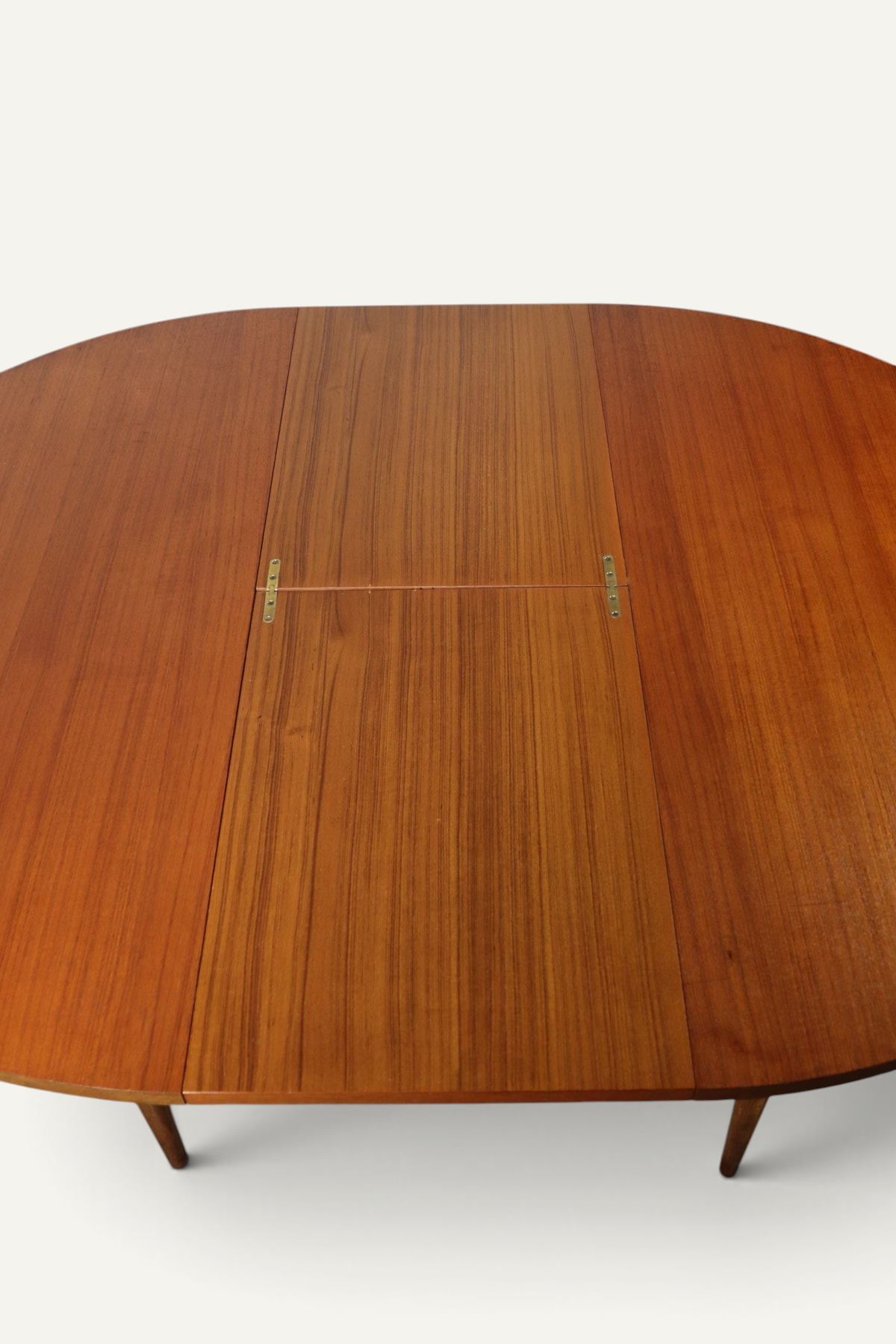 Table de repas ronde extensible en teck – années 60