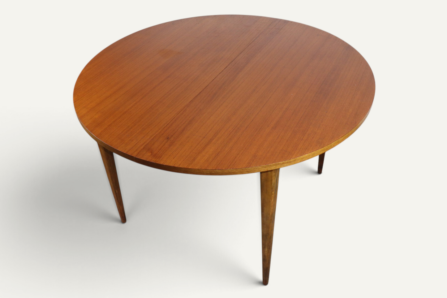 Table de repas ronde extensible en teck – années 60